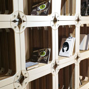 Design of the sample apartments with Lessmore eco-sustainable furnishings. More_Light: modular bookcase in recyclable cardboard. Design Giorgio Caporaso
